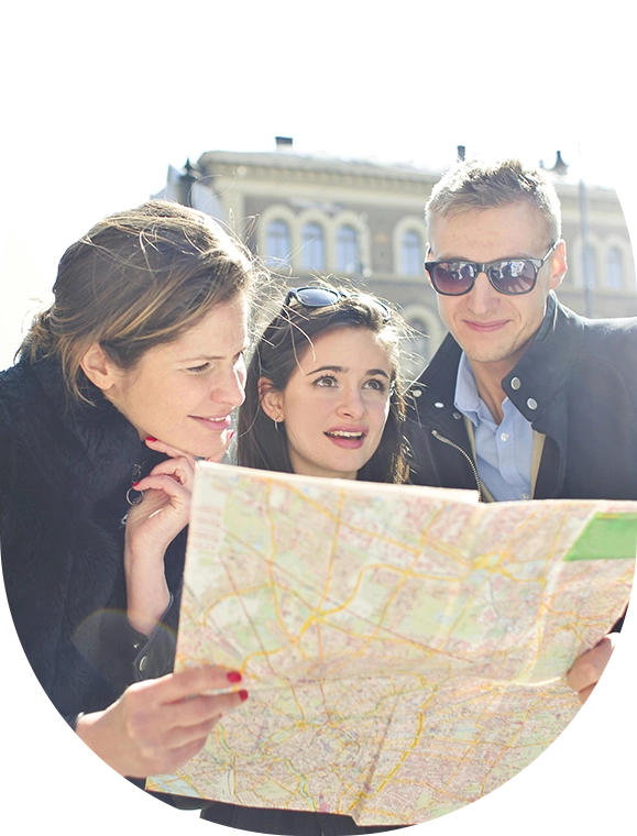 A group of people looking at a map