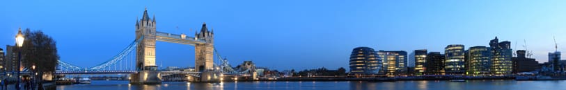 A large body of water with buildings in the background.