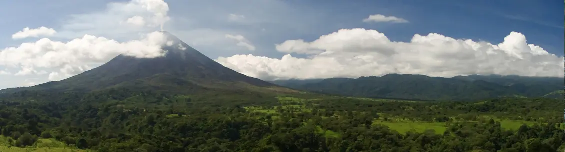 A view of the mountains and trees from above.