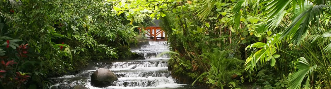 A waterfall with many steps going down it