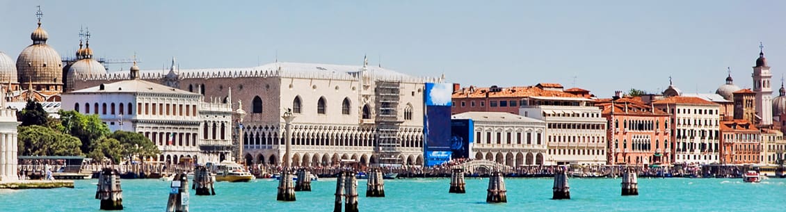 Venetian buildings and waterfront scene.